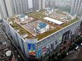 V Číně staví vily na střechách výškových budov
